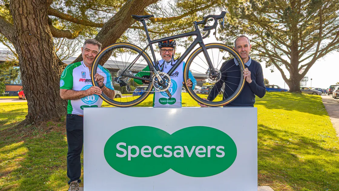 Ian Brown’s 30-30 Cycle Challenge is running again this year for Les Bourgs Hospice. Pictured left to right, Rob Jones from Les Bourgs, Nick James from sponsor Specsavers and Ian Brown.