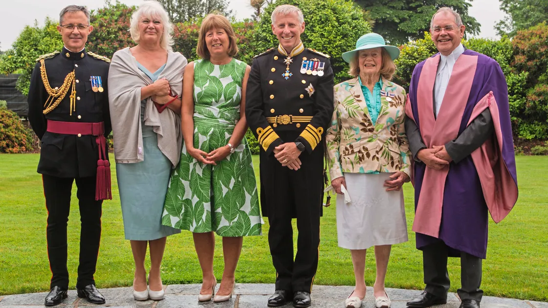 Saturday’s rain forced The Queen’s Birthday reception to be held indoors at Government House, but the weather relented enough for this photograph to be taken outdoors.Left to right, Marco Ciotti the Lt-Governor’s secretary, Government House second cook Sarah Penney, who received a special award from her Majesty, Lady Corder, Lt-Governor Vice Admiral Sir Ian Corder, Rosemary James, who was awarded the BEM, and Jurat Stephen Jones, who was awarded the OBE.                                                                     (Picture by Ben Fiore, 21685897)