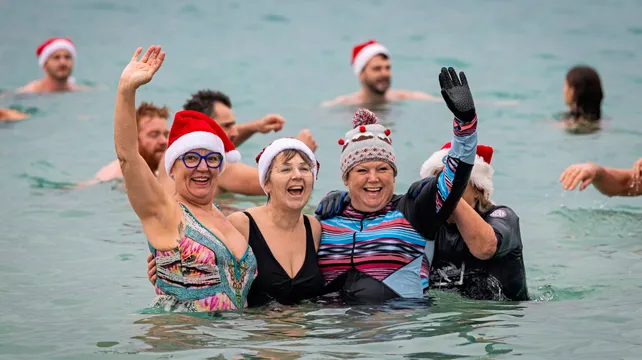 Hundreds brave the sea at Christmas charity dips