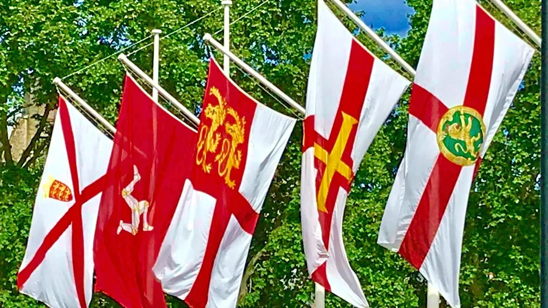 Flags of the UK Crown Dependencies flying in Parliament Square, opposite the House of Commons in Westminster. As of last weekend, Channel Island flags will be flown in New Palace Yard on Liberation Day and Homecoming Day every year.                        (29532283)