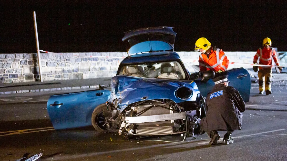 Single vehicle crash along the front in middle of night