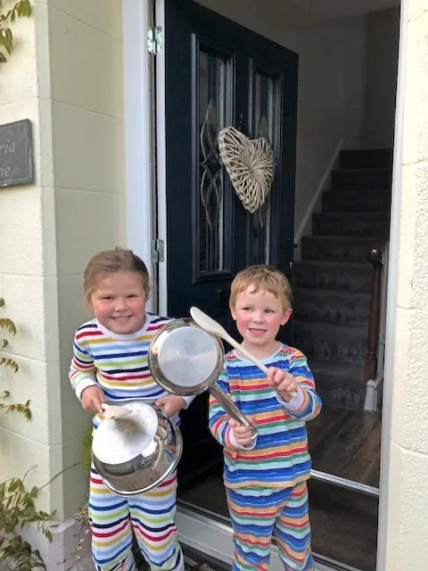 Picture supplied. 16-04-20 Georgia Tyson (age 5) and Charlie Tyson (age 3) in St. Peter Port banging their pans for all the wonderful carers. (28042921)