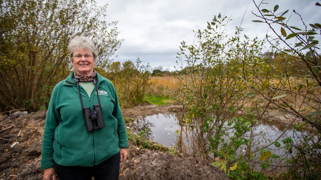Volunteer warden Julie Davis at Le Grand Pre, off La Blanche Carriere in the Vale, which is managed by La Societe. Planning permission has been given for a 57m boardwalk. (Picture by Sophie Rabey, 30184456)