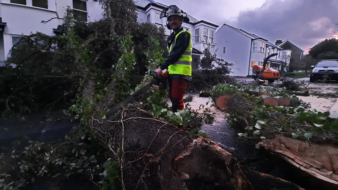 Hugo Ciotti of RH Tree Services clearing fallen treees at Les Ozouets on Friday morning