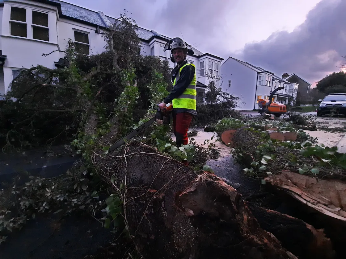 Hugo Ciotti of RH Tree Services clearing fallen treees at Les Ozouets on Friday morning