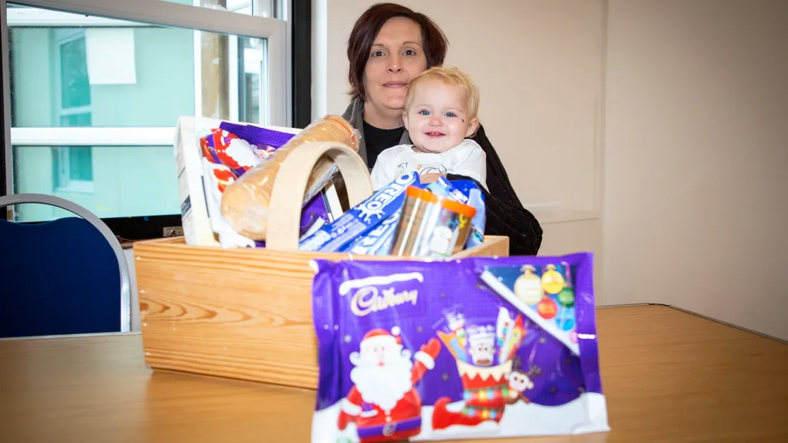 Heidi Billen from the Self-Isolation group is aiming to provide support over the festive period by delivering gifts to people who are isolating.  They are also looking for present donations .Heidi with her daughter Raelin (aged 1). (Picture by Sophie Rabey, 28853672)
