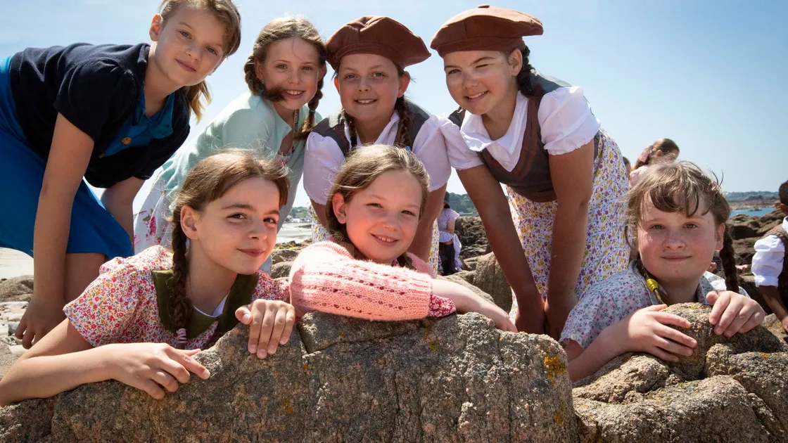 Filming at Grandes Rocques with La Mare de Carteret Primary School for the A La Perchoine musical. Left to right, top row, Lilly-Anne Bichard, Jessica Merrien, Imani Burtenshaw and Tia-Louise Kelling. Bottom row, left to right, Sophie Ferbrache, Maisy Campbell and Angelina Upson. (Picture by Cassidy Jones, 29633178)