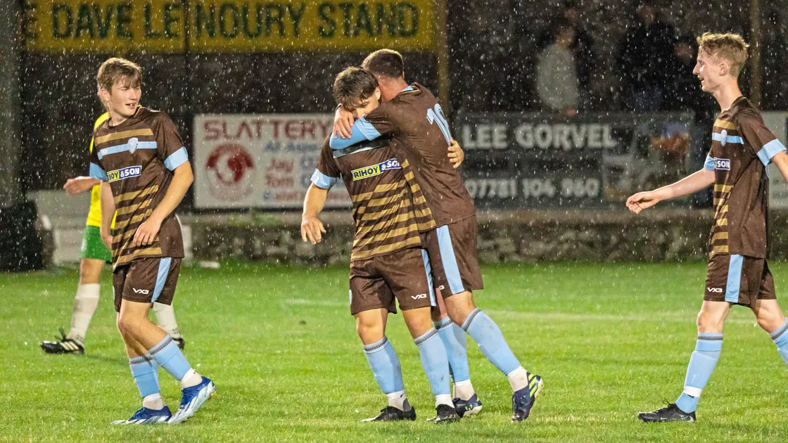 Owen Wallbridge gets a hug from Keene Domaille after one of his two goals last night