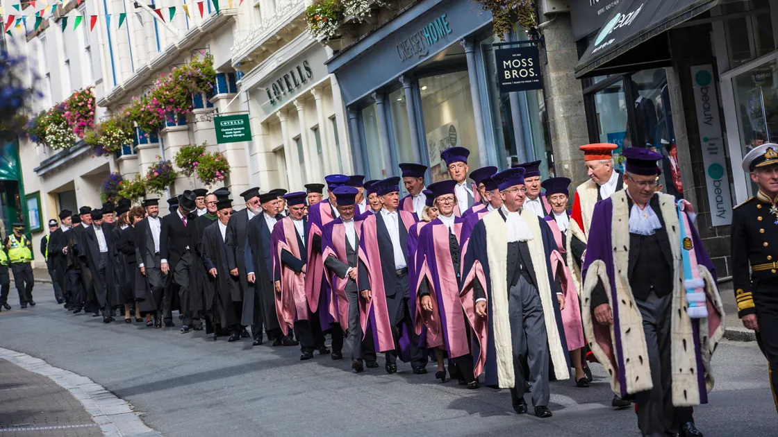 Jurats process to the Town Church following a session of the Court of Chief Pleas. Gavin St Pier believes that the method of funding jurats through the fees from the conveyancing court should be replaced with an annual stipend. 
