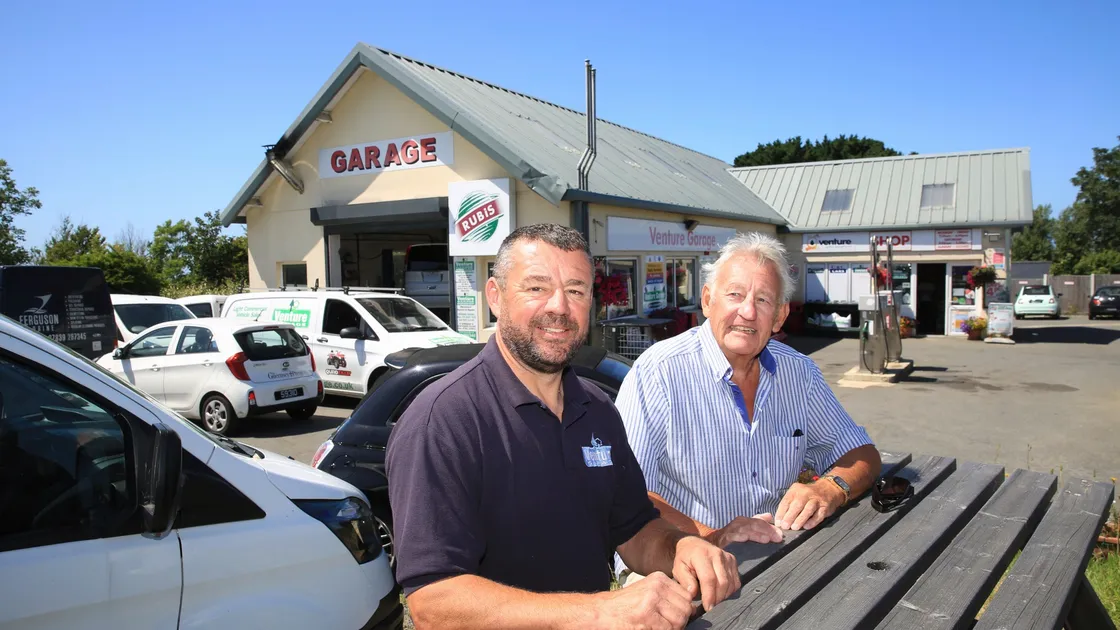 After running Venture Garage for 20 years, Chris McClean, left, has become its owner, having bought the business from Mike Jeffreys. (Picture by Adrian Miller, 28440979) 