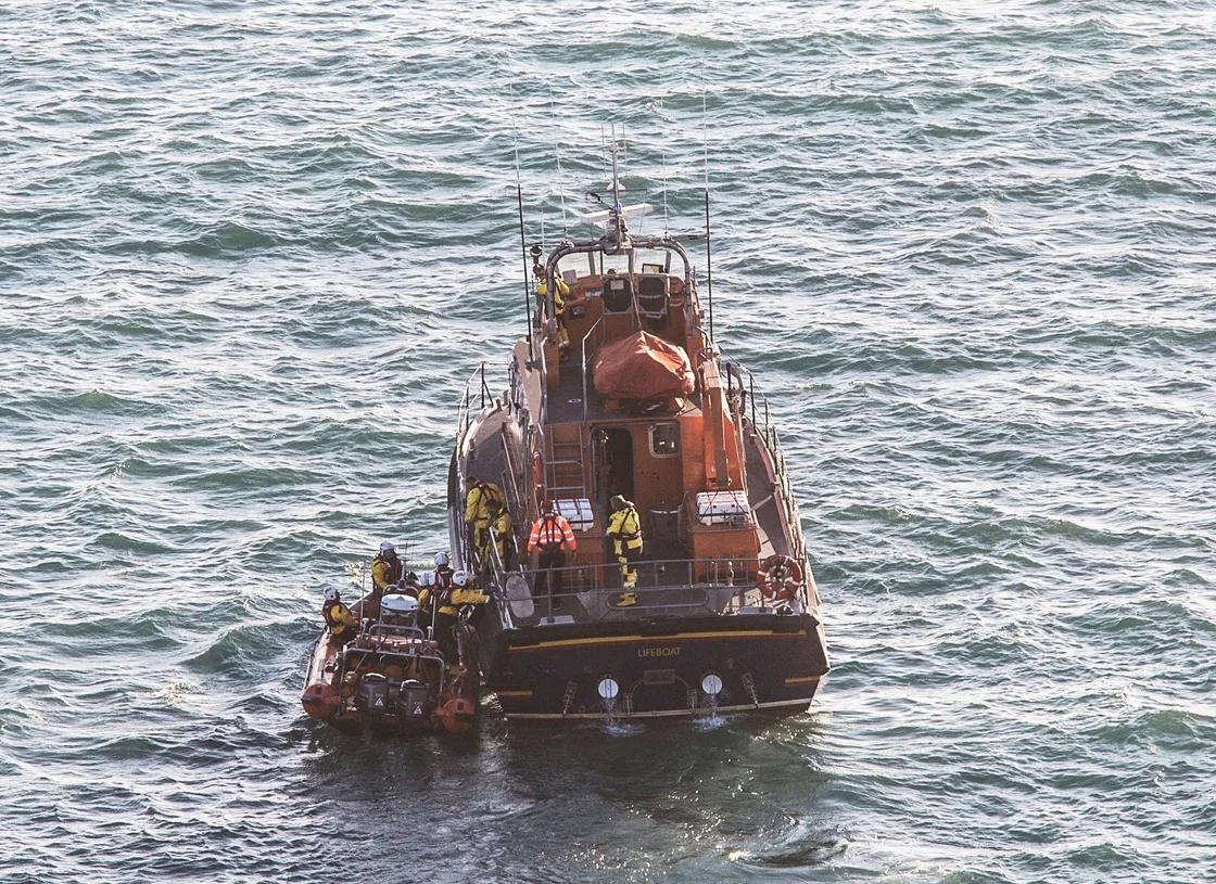 The inshore lifeboat transferring the casualty to the all weather lifeboat for it to head back to St Peter Port harbour to meet an ambulance. (Picture by Adrian Miller, 29341049)
