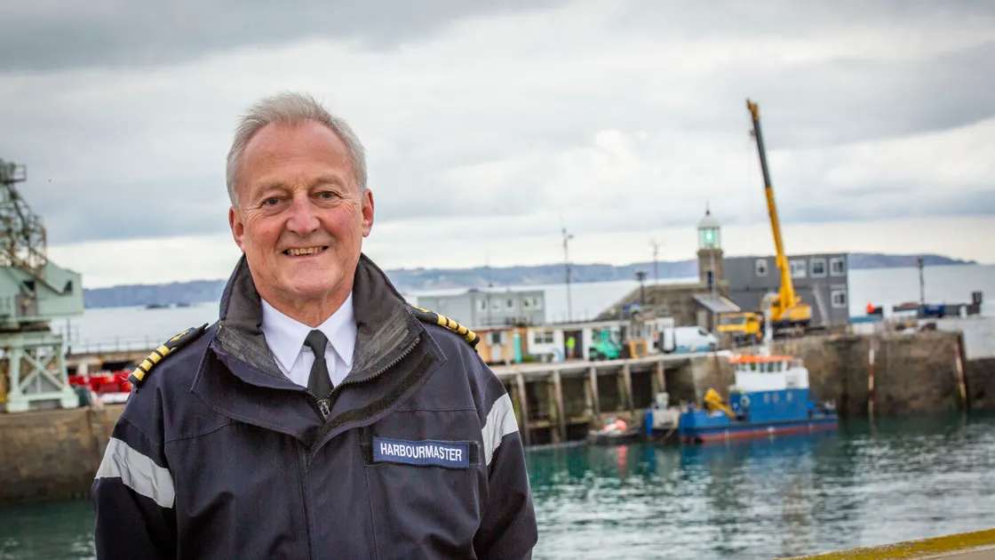 Guernsey harbour master Captain David Barker, pictured at St Peter Port Harbour in 2021, with the oldsignal station on the pier head in the background. Guernsey Coastguard is set to join Guernsey PortsVessel Traffic Services to create a dedicated maritime operations centre at the newly-rebuilt site. (Picture by Sophie Rabey, 33282812)