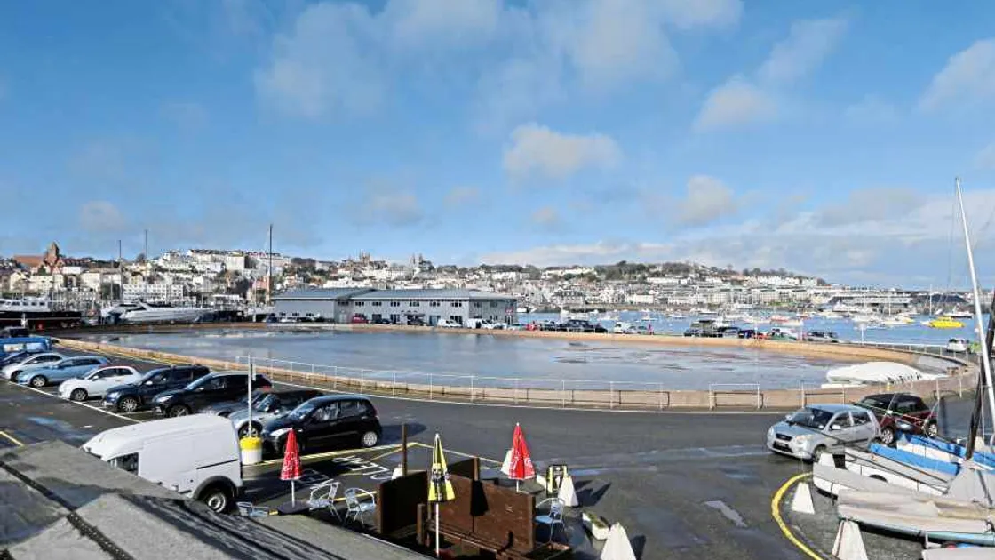 Model yacht pond being refilled after cracks are sealed