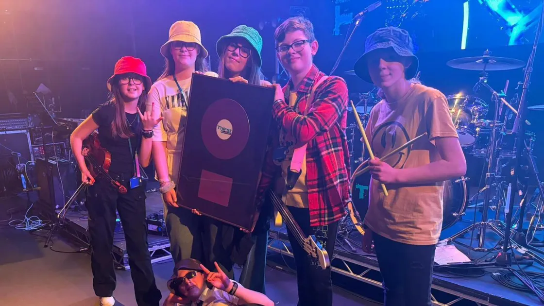 Battle of the School Bands winners Cheezy Beanz headlined the two-session event at Delancey Elim Church. (33099193)