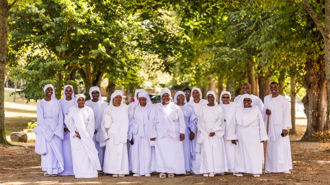 The Johane Masowe Chishanu Apostles, a religious independent Christian community that was formed in Zimbabwe in 1931, have been enjoying a break in Guernsey. They are pictured in Cambridge Park. 					 (Picture by Sophie Rabey, 34866689)