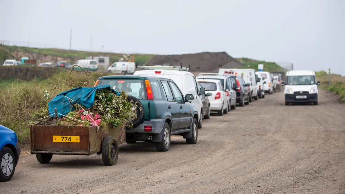 Picture by Sophie Rabey.  27-04-20.  Green Waste sites are back open today to the public today after Coronavirus Lockdown.  They are running at reduced opening hours and subject to health and safety restricions.  Chouet green waste site - backed up traffic from 8am this morning.. (28163306)