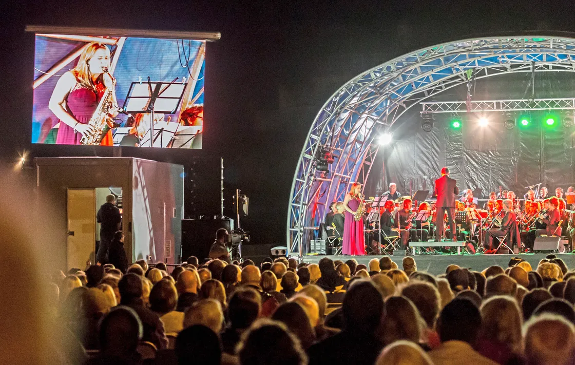Alan’s daughter Katie Gough – herself now a music teacher – playing saxophone with GSW at the 2016 Proms On The Bay event