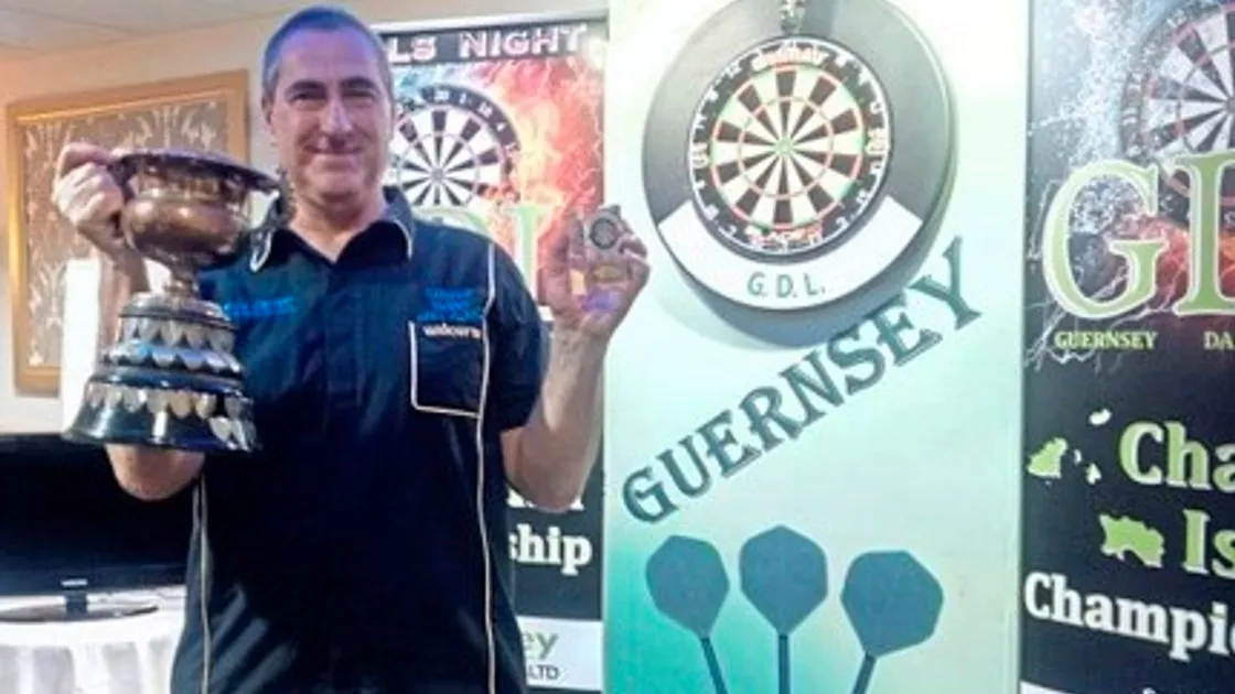 Making history: Herm’s Mike Rowe with the old Rosebowl, the most prestigious individual trophy in Channel Islands darts. It dates back to 1937. (21340692)