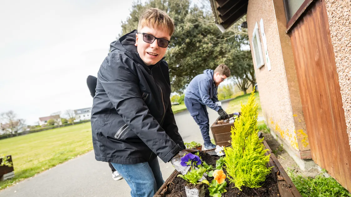 St Sampson’s Douzaine has been planting flowers at Delancey Park for its Floral Guernsey entry, with the help of supported traineeship students from TGI, such as Arnie Moriarty, 17.
