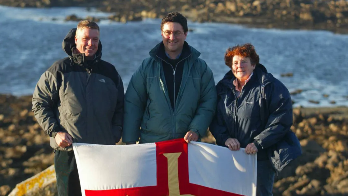 Richard (left) and fellow Lihou Charitable Trust steering committee members David Le Feuvre and Denise Fawcett celebrate after the States decide to grant a 21-year lease on the island in December 2005