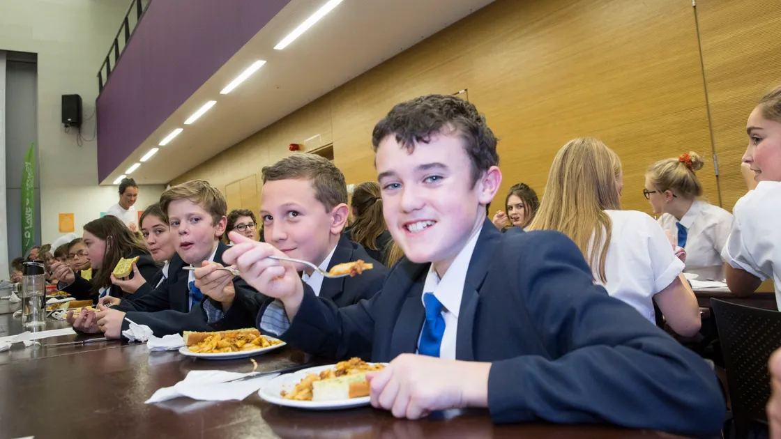 The Big Feed. More than 500 pupils and staff enjoy a free lunch to help highlight how much money islanders waste by throwing away food. Nearest the camera, left to right, Frazer Setters, and Jowan Way, both 13. (Picture by Adrian Miller, 26464380)