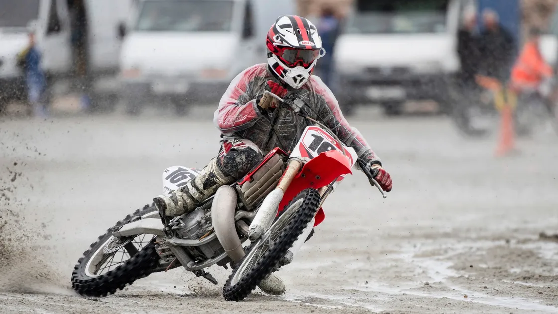 Mark King sliding in the heat of the ‘Battle of the Beach’ at Vazon Bay this summer. (Picture by Andrew Le Poidevin, 22682485)