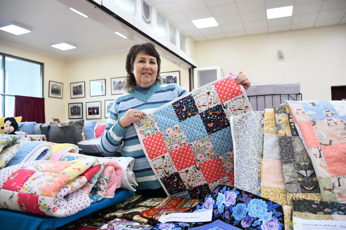 Michaela Cleal has been selling a range of handmade goods including quilts, table runners, pouches and hot pads at the market for seven years or more. (31676932)