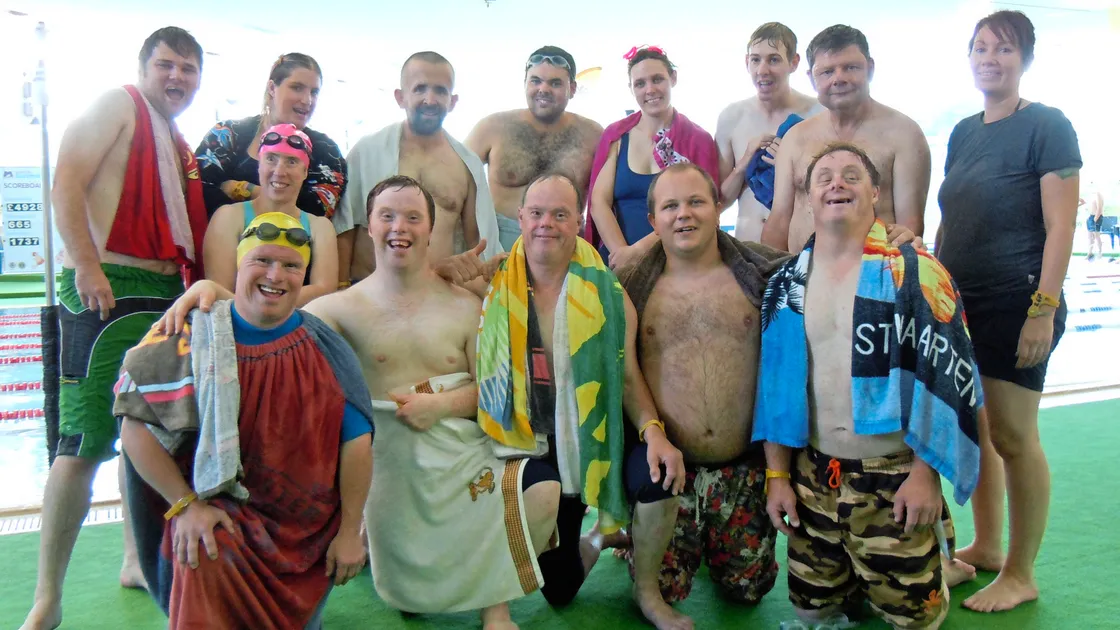 Teams from The Guernsey Sports for the Disabled Association that took part in the 2017 Skipton Swimarathon at Beau Sejour. David Parsons (kneeling, centre) won the trophy for the most improved disabled swimmer. (Picture by Nigel Baudains, 19540633)