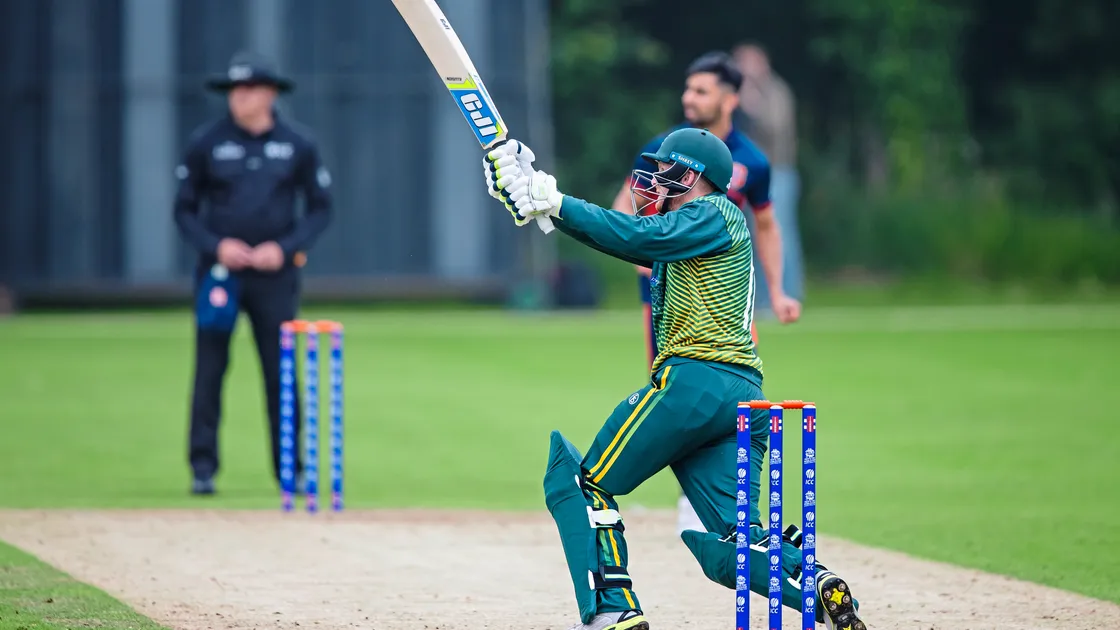 David Hooper hits a six in the final over to help Guernsey beat Norway at the KGV. (Picture by Martin Gray, 24997194)