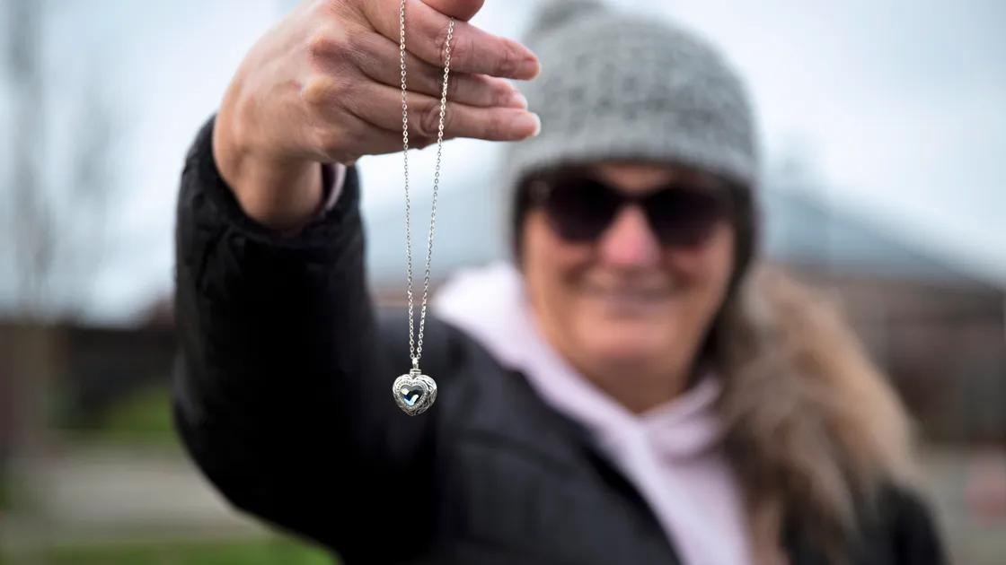 Barbara Crowson with the locket she found in the Les Beaucamps High School car park. She is keen it is returned to its rightful owner.
(Pictures by Luke Le Prevost 30492657 )