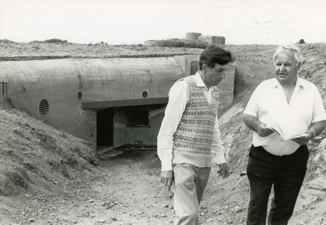 Fort Hommet gun casemate in 1993 after the excavation. Richard with Andre Lemee who carried out the original blasting of the rock in April 1943.