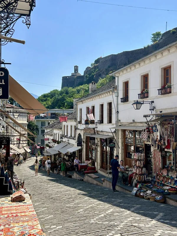 Gjirokaster’s Old Bazaar - a network of alleyways lined with handicraft shops and alfresco dining.