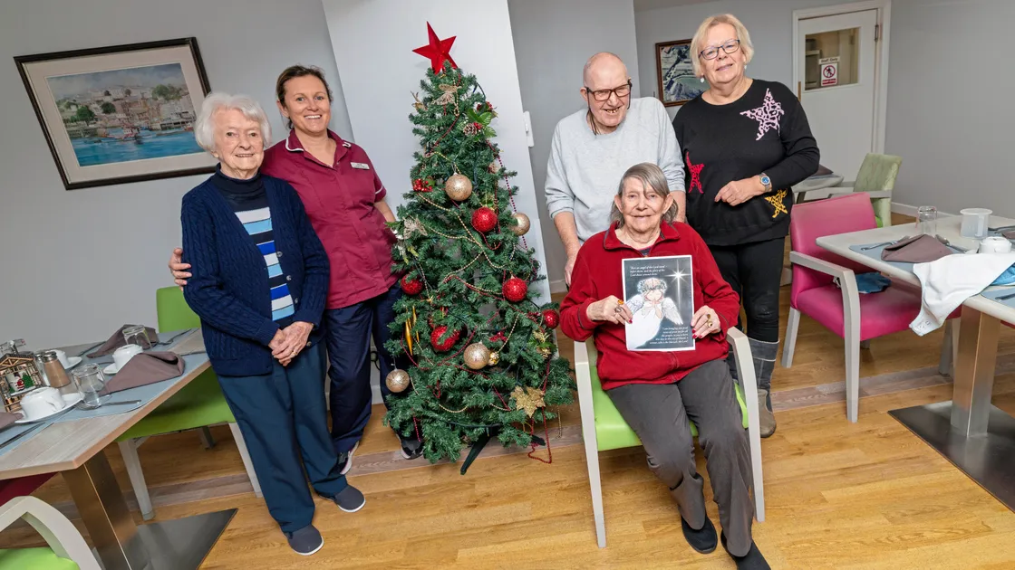 Gardenia Lodge residents created four different festive card designs based around the theme of joy. Left to right: Dot Kelling, activities co-ordinator Heidi Clayton, Jim Gillespie, Tjaltje Jungerius and organiser Beverley Linnecor