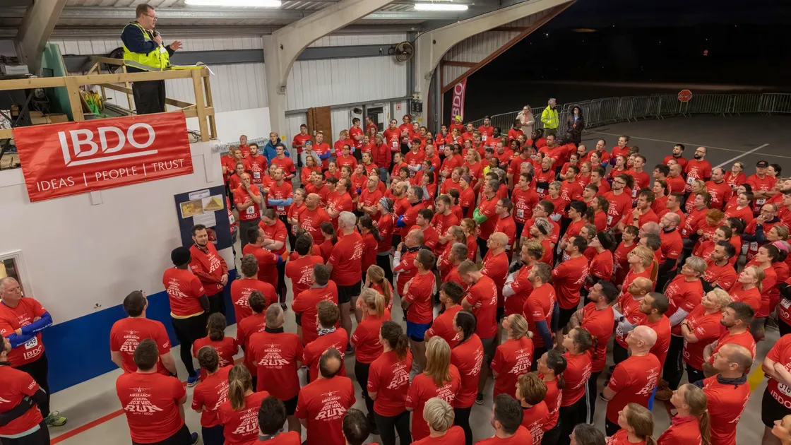 A briefing for a previous Runway Run which this year will benefit Air Search.