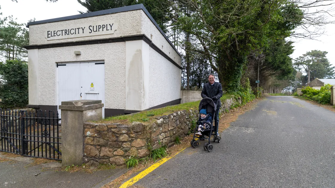 John Renouf and his grandson Ezra Mortimer, 1, walk up the lane on a regular basis.