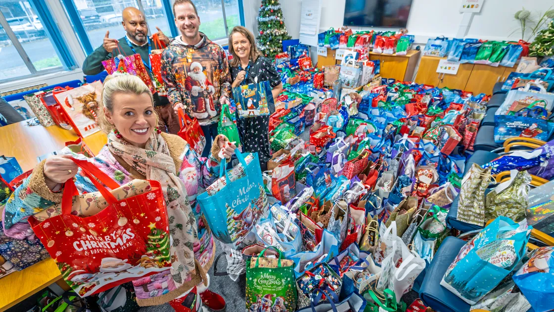 Left to right: Donna Patch, founder and organiser of Gifts for the Elderly and Vulnerable, social care team co-ordinator Colin Moodley, helper and volunteer Matthew Patch, and community health manager Michelle MacMurray, with some of the presents to be delivered to elderly and vulnerable people receiving care through Adult Community Services