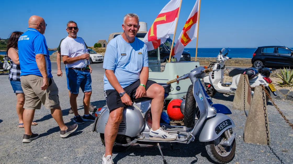Jason Shambrook takes a seat on his 1961 Vespa GS150.