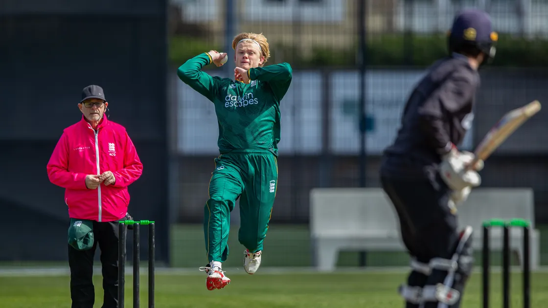 Teenager Ed Robinson bowling for Guernsey against the Surrey Academy last month at the KGV.