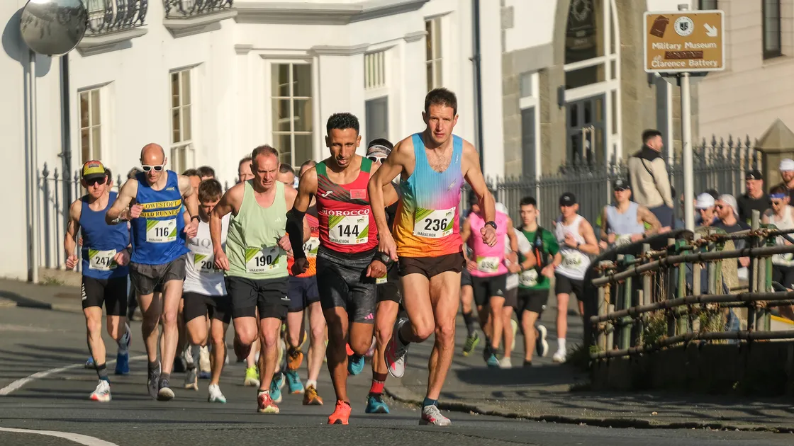 Guernsey’s Rick Weston leads winner Otmane Menbar of Morocco up Le Val des Terres at the start of last year’s race. 