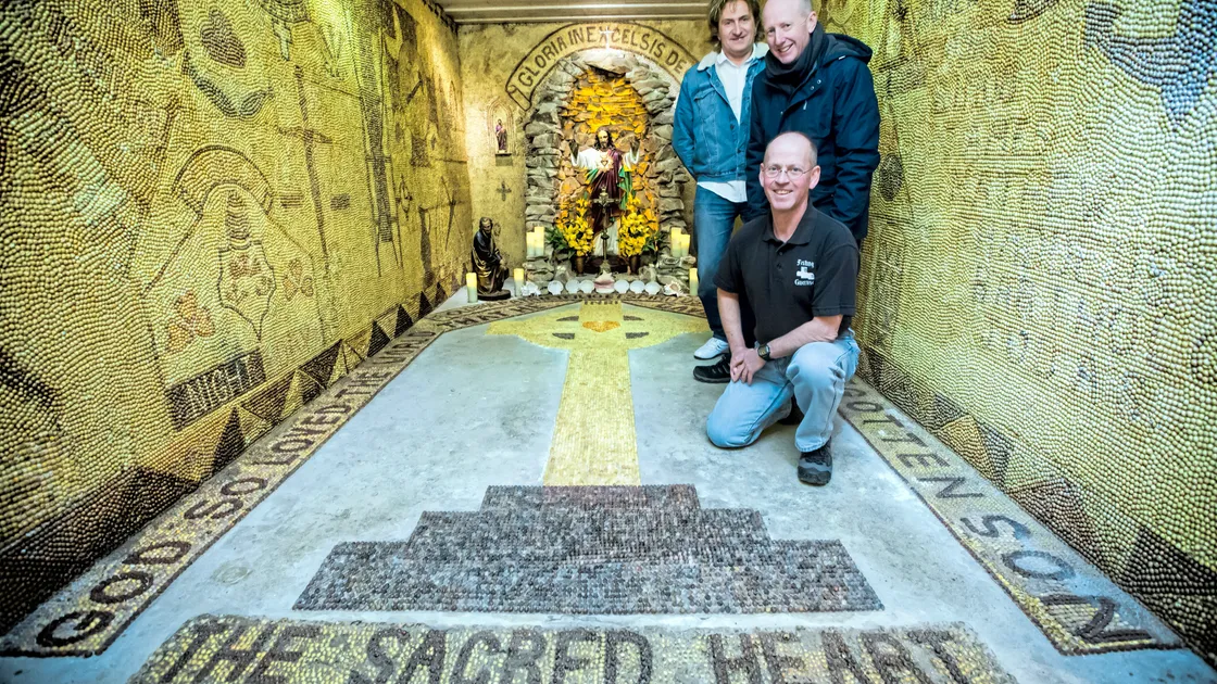 The Shrine of The Sacred Heart at Fort Hommet has had work done to it while closed over the winter and opens today. Pictured, left to right, are, Andy Le Galloudec, the nephew of Bert, who built the shrine, Ian Blanchard, has been involved in the restoration project since the 1970s, and Andy Walker, of Festung Guernsey, which helps out manning the shrine on open days.(Picture by Peter Frankland, 21040097)
