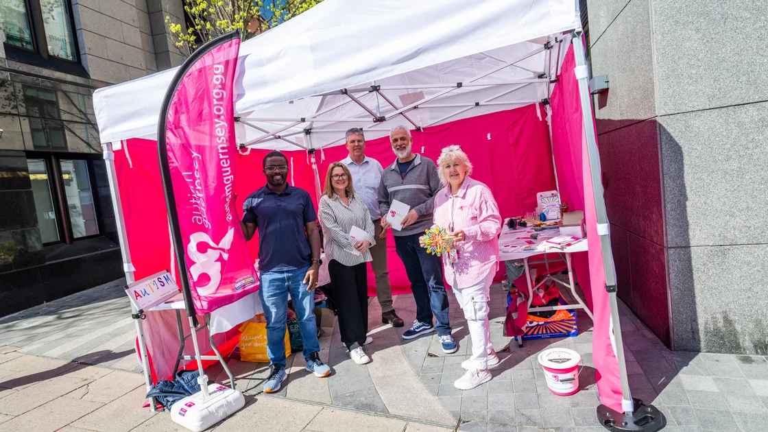 To mark Global Autism Day, Autism Guernsey set up a stand outside Savills in town to raise awareness. Left to right, Itayi Chibaya, who is running the London Marathon later in April to raise money for the charity, Jackie Lee, Paul Watts from Savills, Heath Cogher and the charity’s CEO Julia Watts.  (Picture by Sophie Rabey, 34695781)
