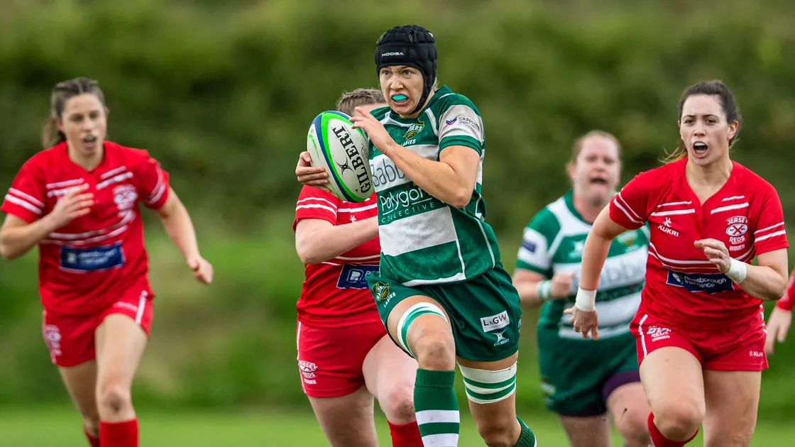 Fallaize breaking Jersey's line on her Siam Cup debut in 2021. (Picture from Martin Gray/Guernsey Sport Photography)