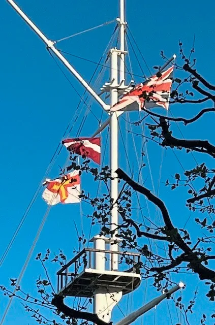 The country’s flag was raised alongside the Guernsey and Union ones.