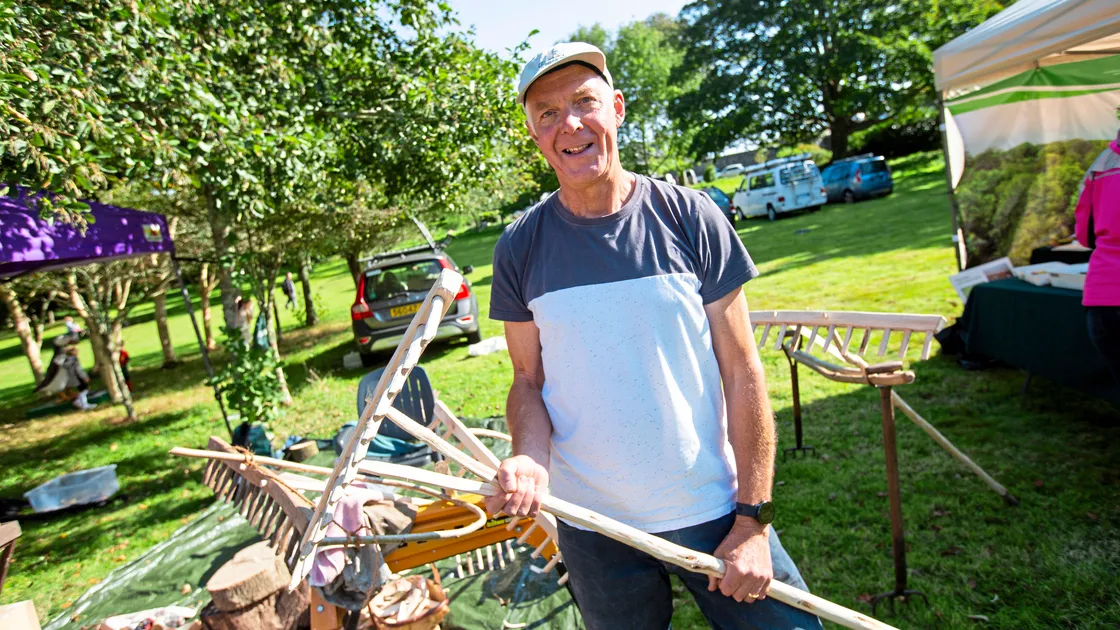 Francis Russell with one of his handmade wooden hay rakes. (Picture by Sophie Rabey, 33660849)