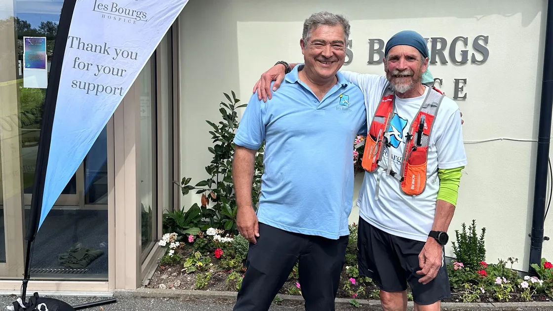Mark Prevel smashed a 1,000-mile walk-run world record in support of Les Bourgs Hospice. Pictured with him is Rob Jones CEO Les Bourgs. 				 (34821898)