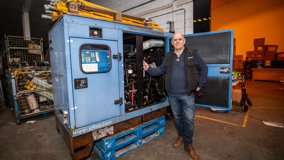 Marc with a generator delivered to Ukraine in 2023.