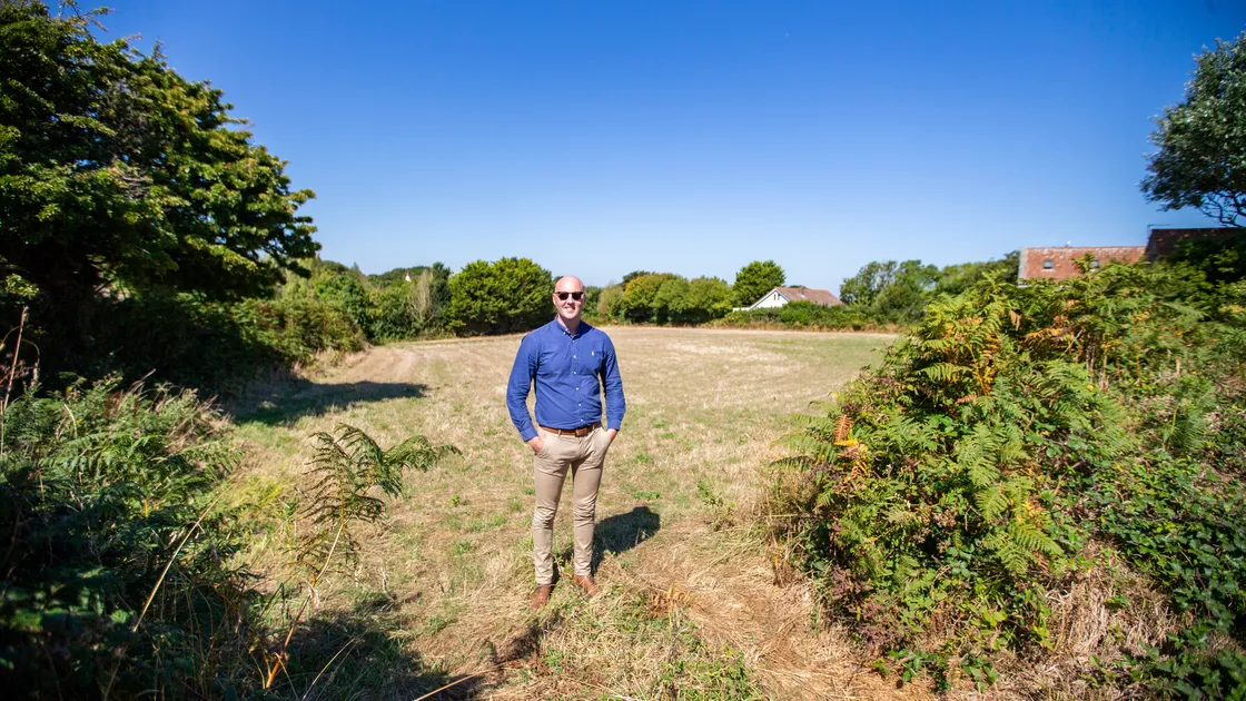 Ben McVey from Cooper Brouard which will be auctioning off 10 vacant agricultural fields in St Peter’s and Torteval are going up for auction on 26 August. (Picture by Luke Le Prevost, 31138924)