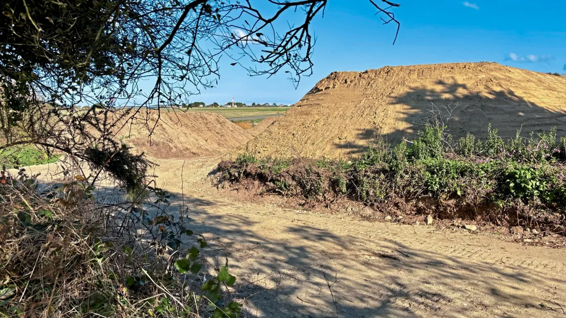 Work carried out on this agricultural field which has no planning permission has sparked concerns for the National Trust, among others, about what it claims is becoming a widespread practice