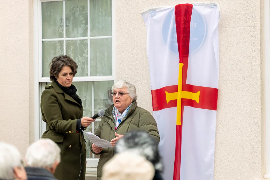 Former teacher Yvonne Hodder who nominated Miss de Garis for the plaque. Holding the microphone is head of heritage services Helen Glencross. (34021699)