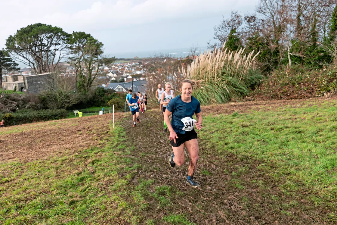 Katie Birch, seen here tackling one of the two particularly steep hills per lap, made the women's podium
